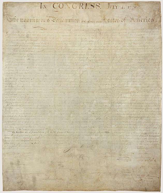 declaration-of-independence-front-630 ‣ I Have An Idea Faded parchment of the U.S. Constitution with dense handwritten text and a large heading along the top, indicating a historic legal document.